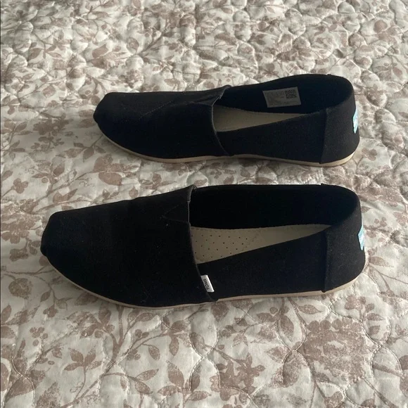 TOMS Black Canvas Slip-Ons - Picture 2 of 9